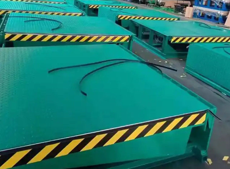 전기 도크 도어 레벨러 워크샵 자동 도크 플레이트 25000-40000LBS 안전한 로딩을 위한 안전 디자인